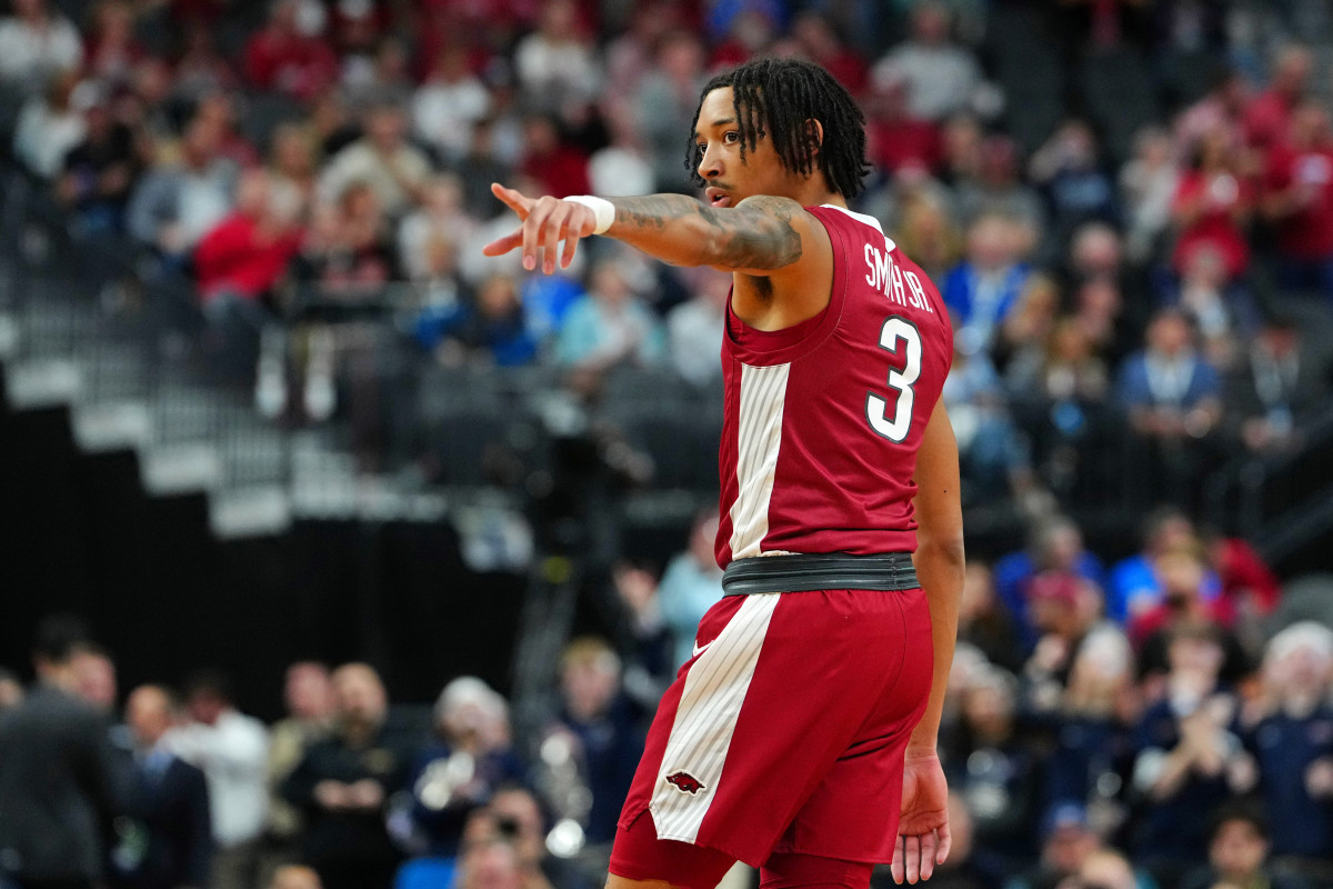 Mar 23, 2023; Las Vegas, NV, USA; Arkansas Razorbacks guard Nick Smith Jr. (3) gestures against the UConn Huskies during the first half at T-Mobile Arena. Mandatory Credit: Stephen R. Sylvanie-USA TODAY Sports